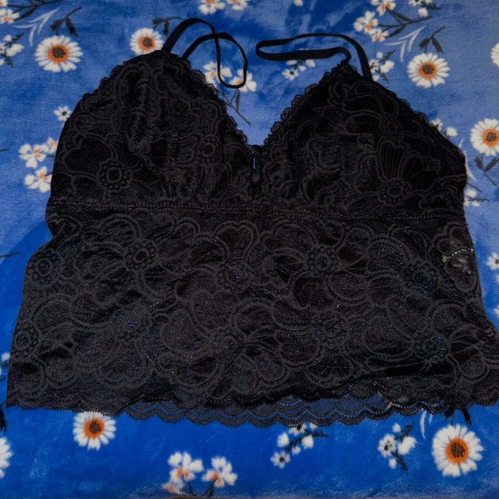 A black lace crop top shirt